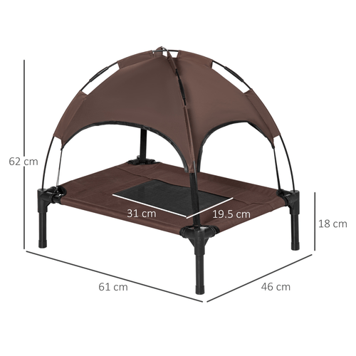 Raised dog bed with sun shade canopy in garden setting — Nuzzle cooling raised pet cot